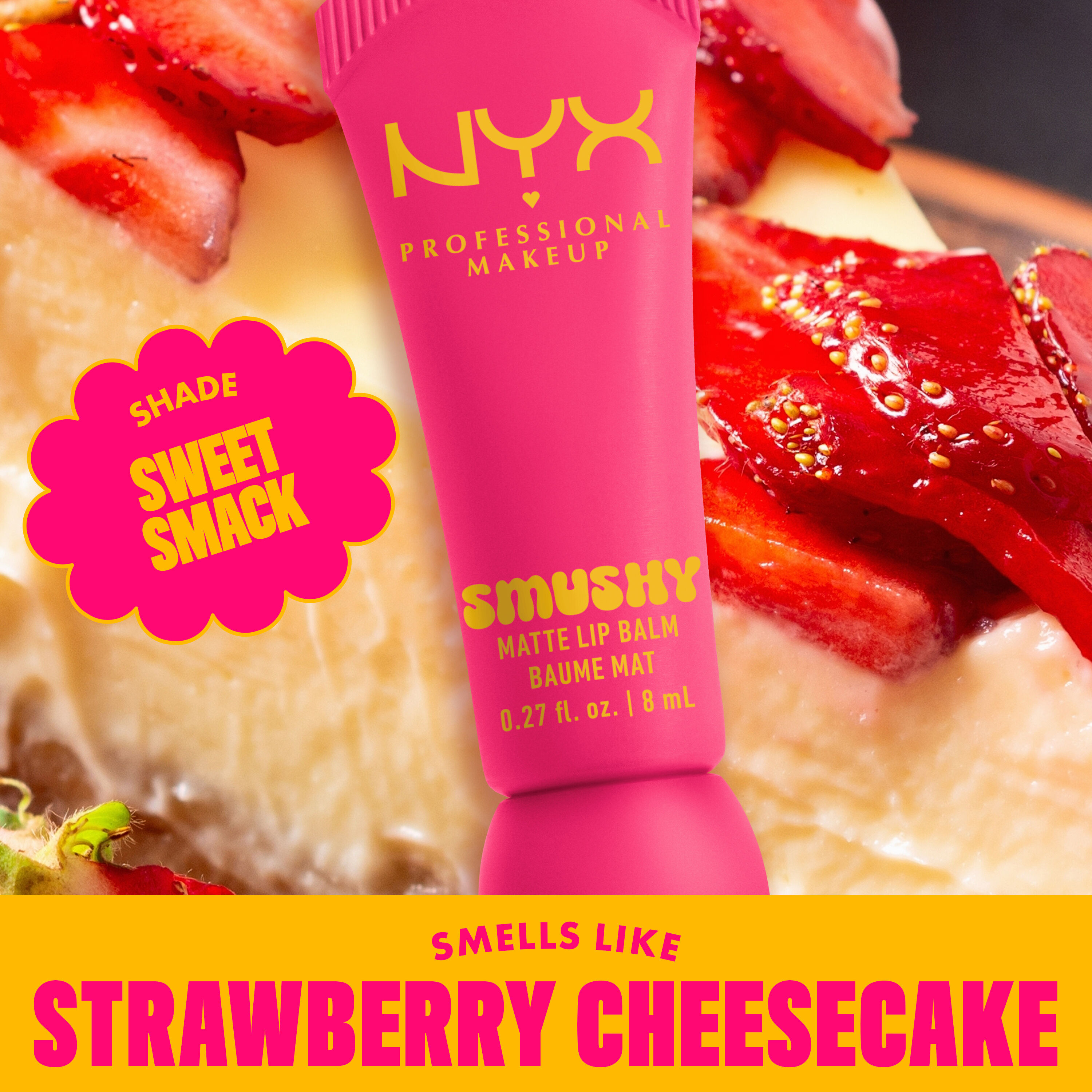 Smushy Matte Lip Balm in shade Sweet Smack on strawberry cheesecake background with text "smells like strawberry cheesecake"