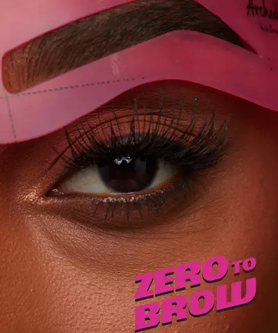 Zero-To-Brow eyebrow stencil over model's eyebrow.