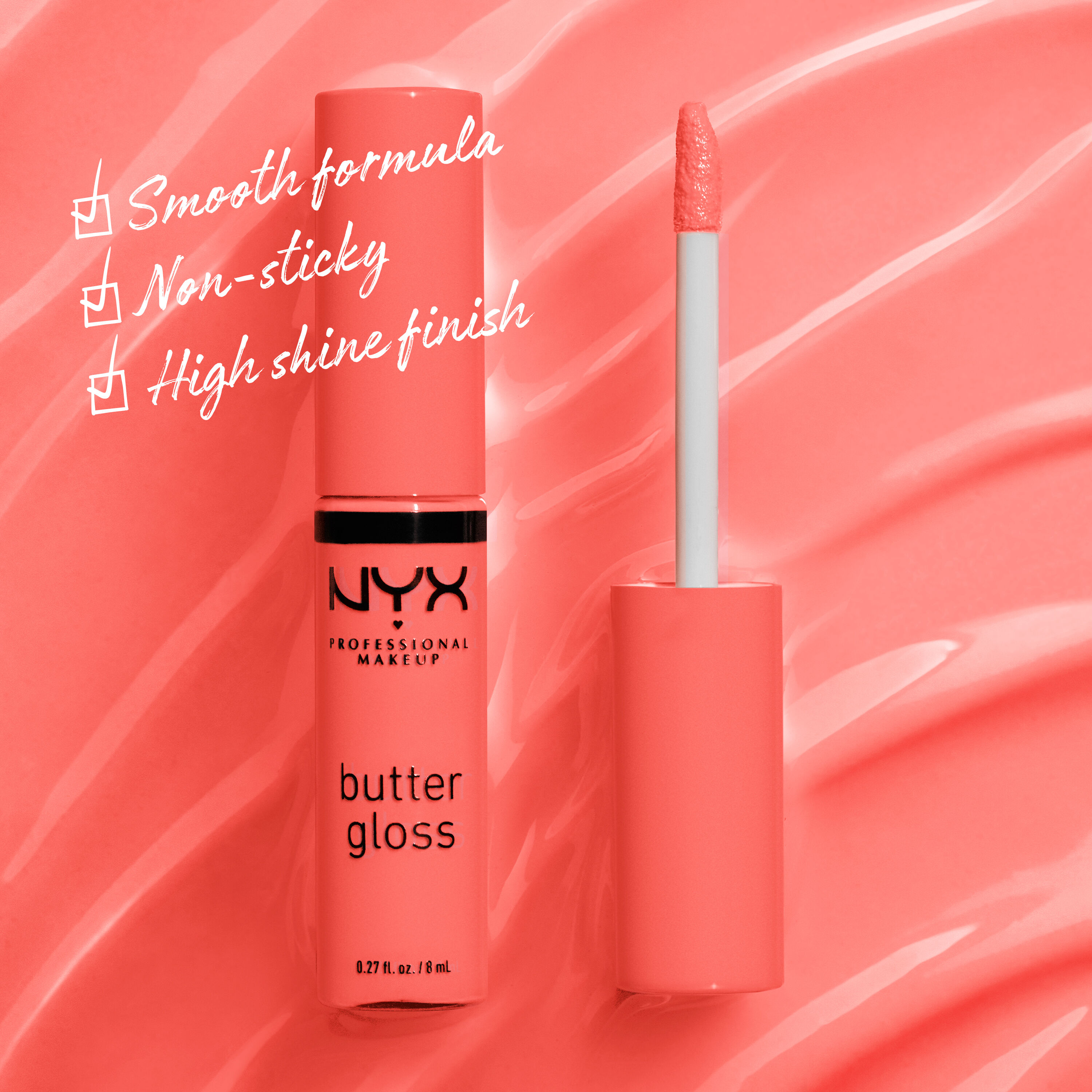 NYX Professional Makeup Butter Gloss in 05 Creme Brulee shown open with smooth formula, non-sticky feel and high-shine finish on a coral background.