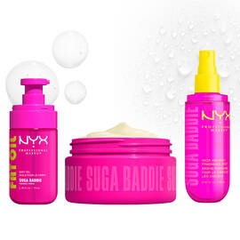 Three bright pink NYX Professional Makeup body care products on a light background: Fat Oil Suga Baddie body oil, Suga Baddie Body Butter in an open jar, and Suga Baddie hair & body fragrance mist.