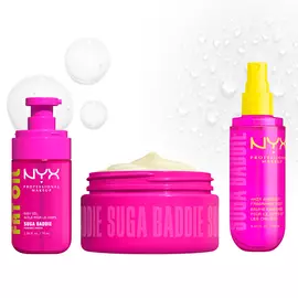 Three bright pink NYX Professional Makeup body care products on a light background: Fat Oil Suga Baddie body oil, Suga Baddie Body Butter in an open jar, and Suga Baddie hair & body fragrance mist.