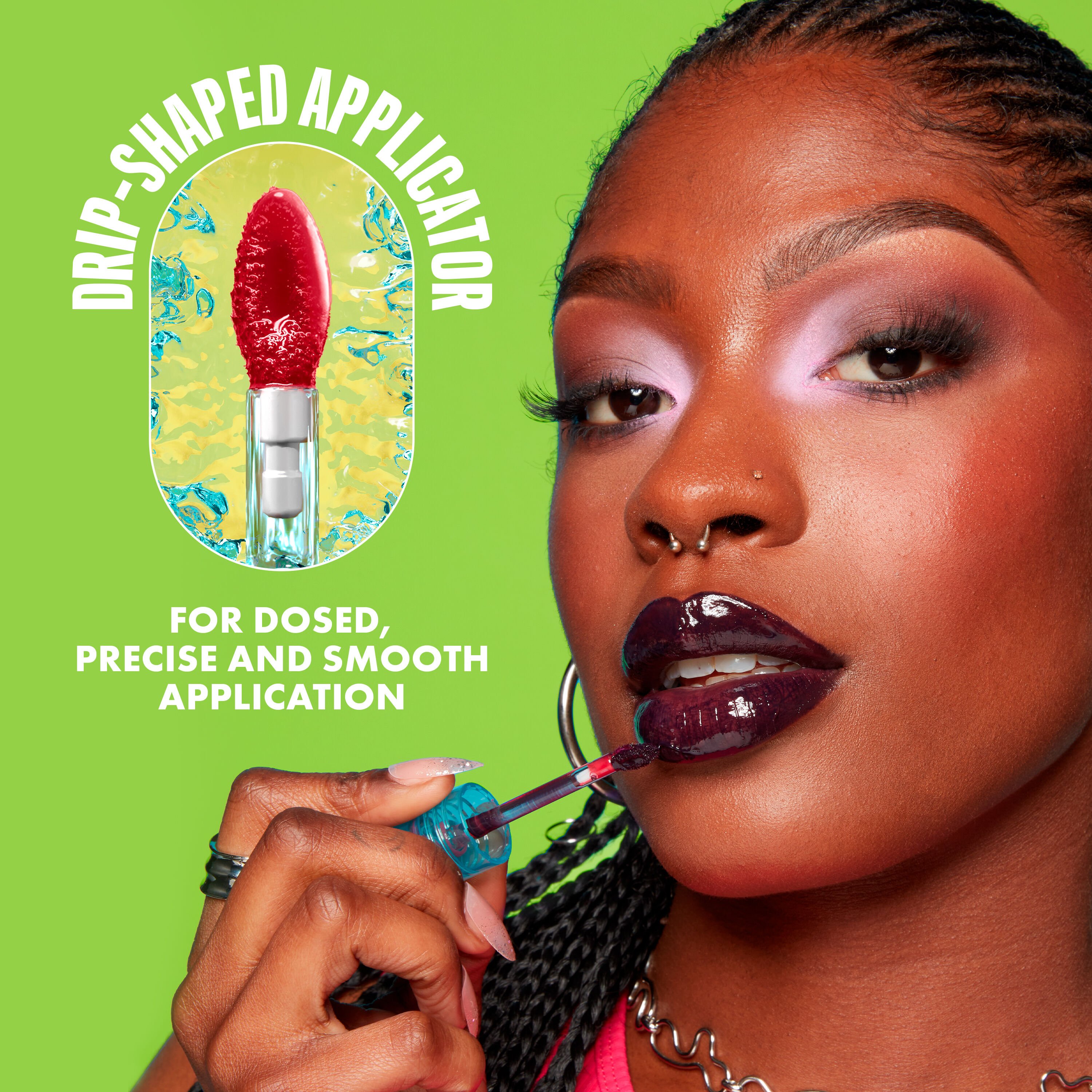 Lip I.V. hydrating lip gloss' doe footed applicator being used on dark skin toned model's lips.