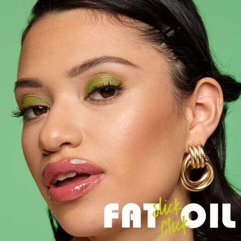 Click and slick the Fat Oil Slick Click lip oil stick for a no-mess nourishing application. This lip oil balm stick is now available in 20 flattering shades!