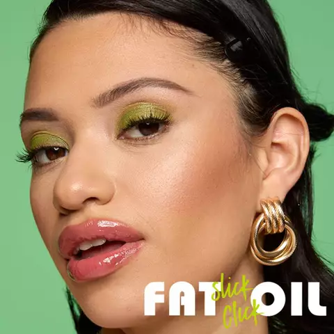 Click and slick the Fat Oil Slick Click lip oil stick for a no-mess nourishing application. This lip oil balm stick is now available in 20 flattering shades!