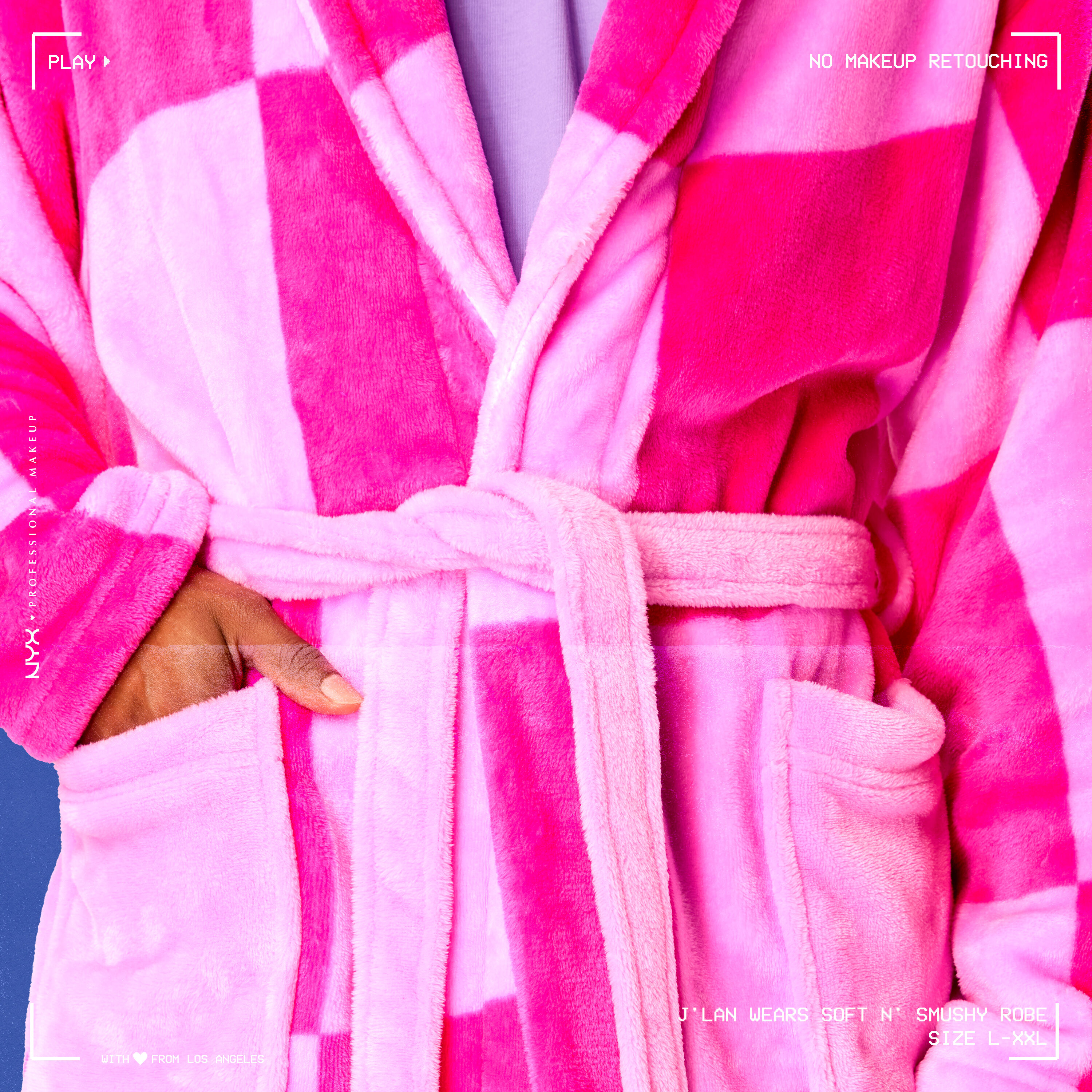 Close up of model wearing Soft n' Smushy Pink Checkered Robe, focusing on front tie sash and pockets