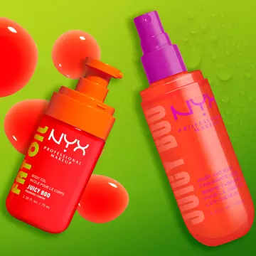 Two NYX Professional Makeup Juicy Boo products on a lime green background with glossy orange and clear bubbles: Fat Oil body oil in a bright orange pump bottle and hair and body fragrance mist in a coral spray bottle.
