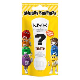 NYX Professional Makeup M&M'S Smushy Surprize Matte Lip Balm Blind Bag in bright yellow packaging with a white lip balm silhouette, large question mark, NYX logo, and colorful M&M'S characters on the front.