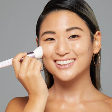 Bare with me skin serum brush on model