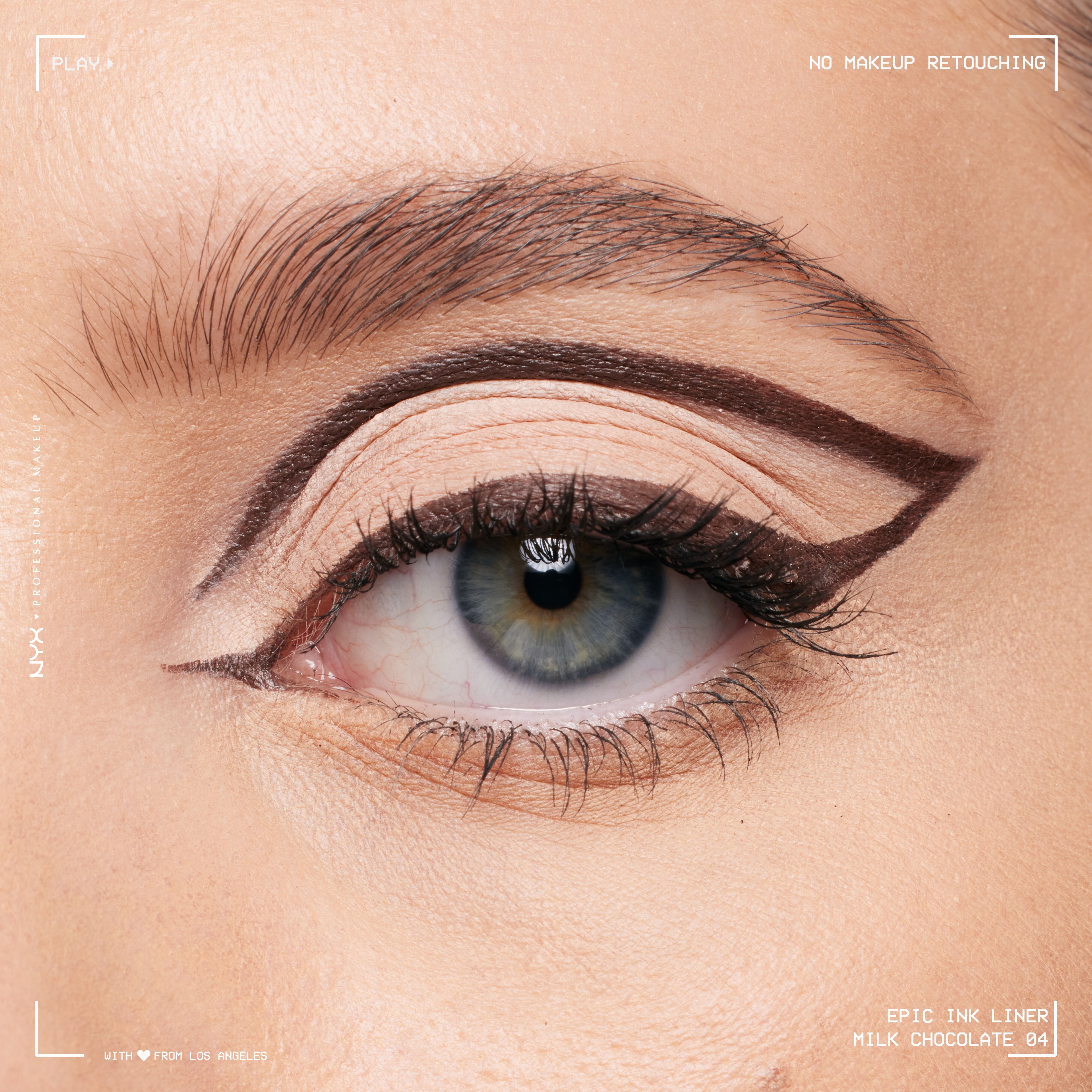 Close-up of an eye wearing Epic Ink Liquid Liner in Milk Chocolate, in a cat eye connected floating eyeliner look
