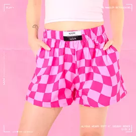 Model wearing Soft n' Smushy Pink Checker Print Boxers in a size small