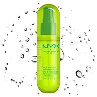 Front packshot of Coconut Cutie spray mist with droplet particles on white background.