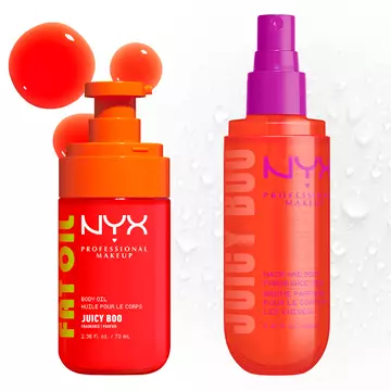 Two NYX Professional Makeup Juicy Boo products on a light background: Fat Oil body oil in a bright orange pump bottle and hair & body fragrance mist in a coral spray bottle with purple pump.