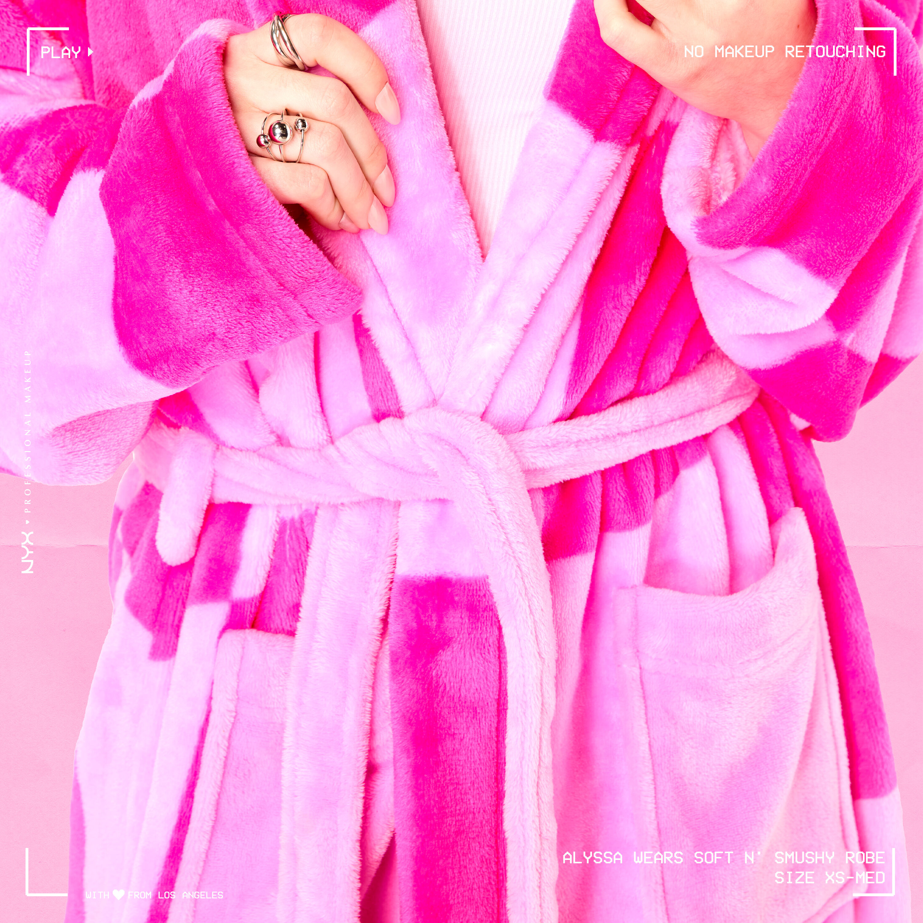 Close up of model wearing Soft n' Smushy Pink Checkered Robe, focusing on front tie sash and pockets