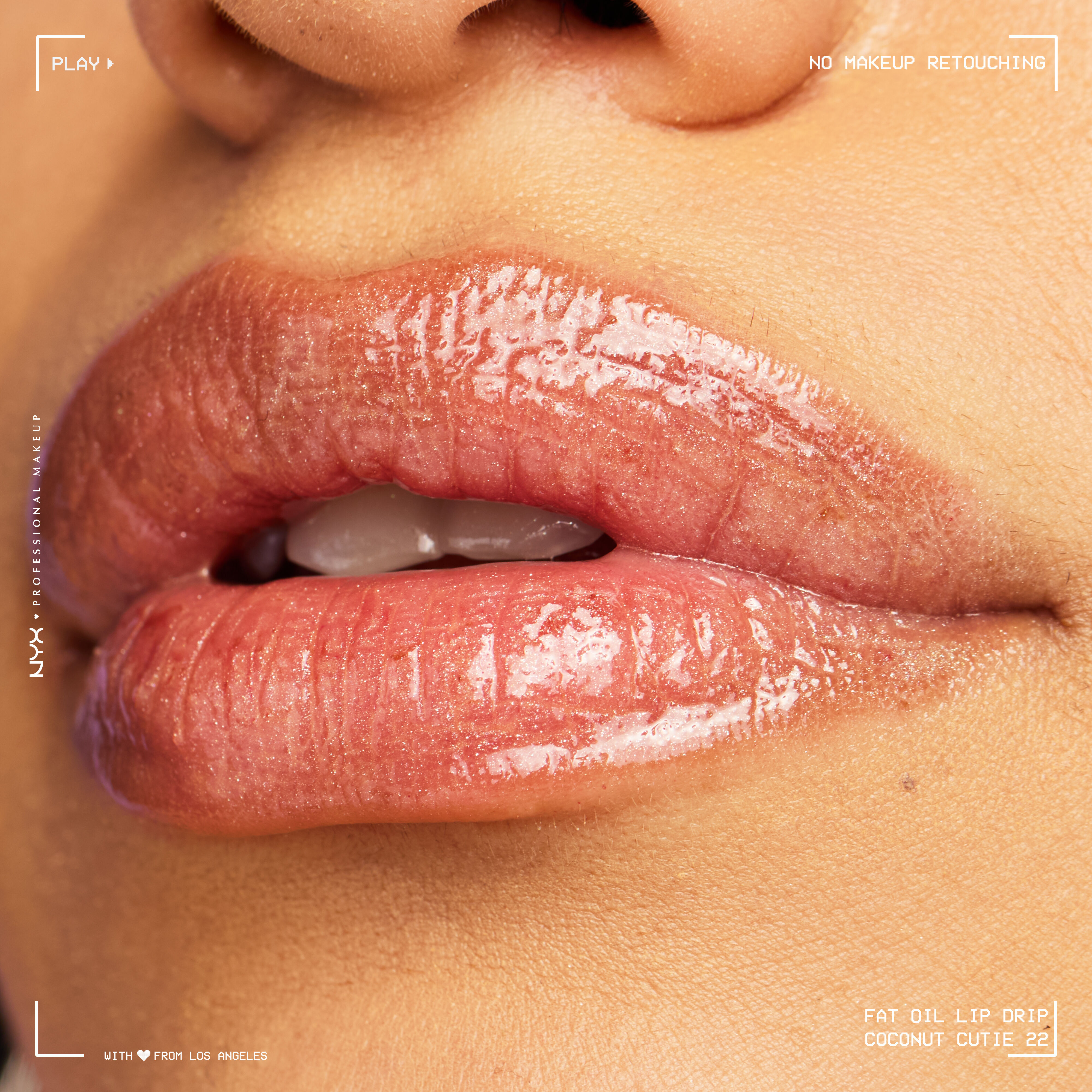 Close-up of model with medium skin tone wearing Fat Oil Lip Drip in Coconut Cutie, showing hydrated shine and natural texture.