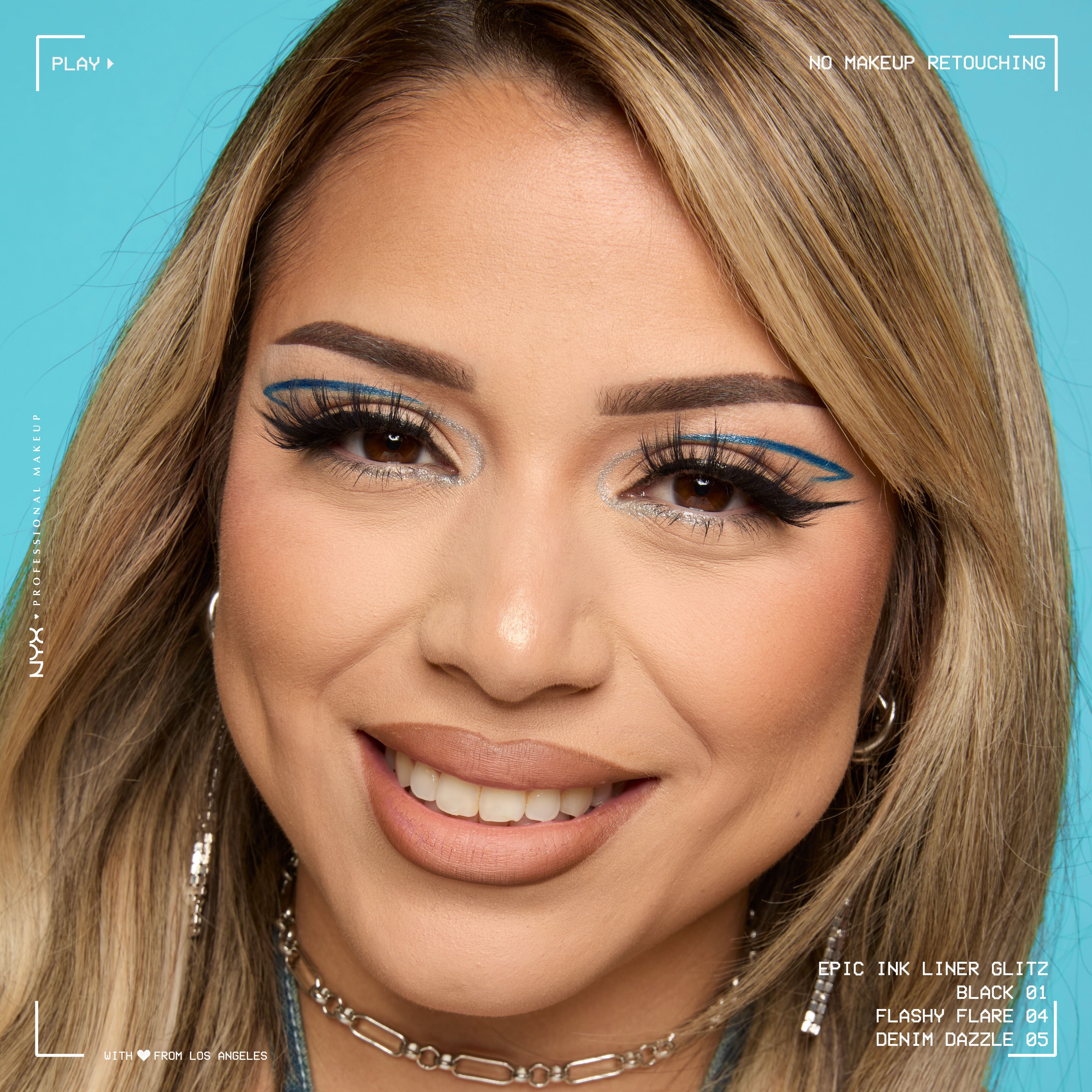 Smiling model wearing Epic Ink Liquid Liner in Black, Flashy Flare, and Denim Dazzle in a graphic liner look