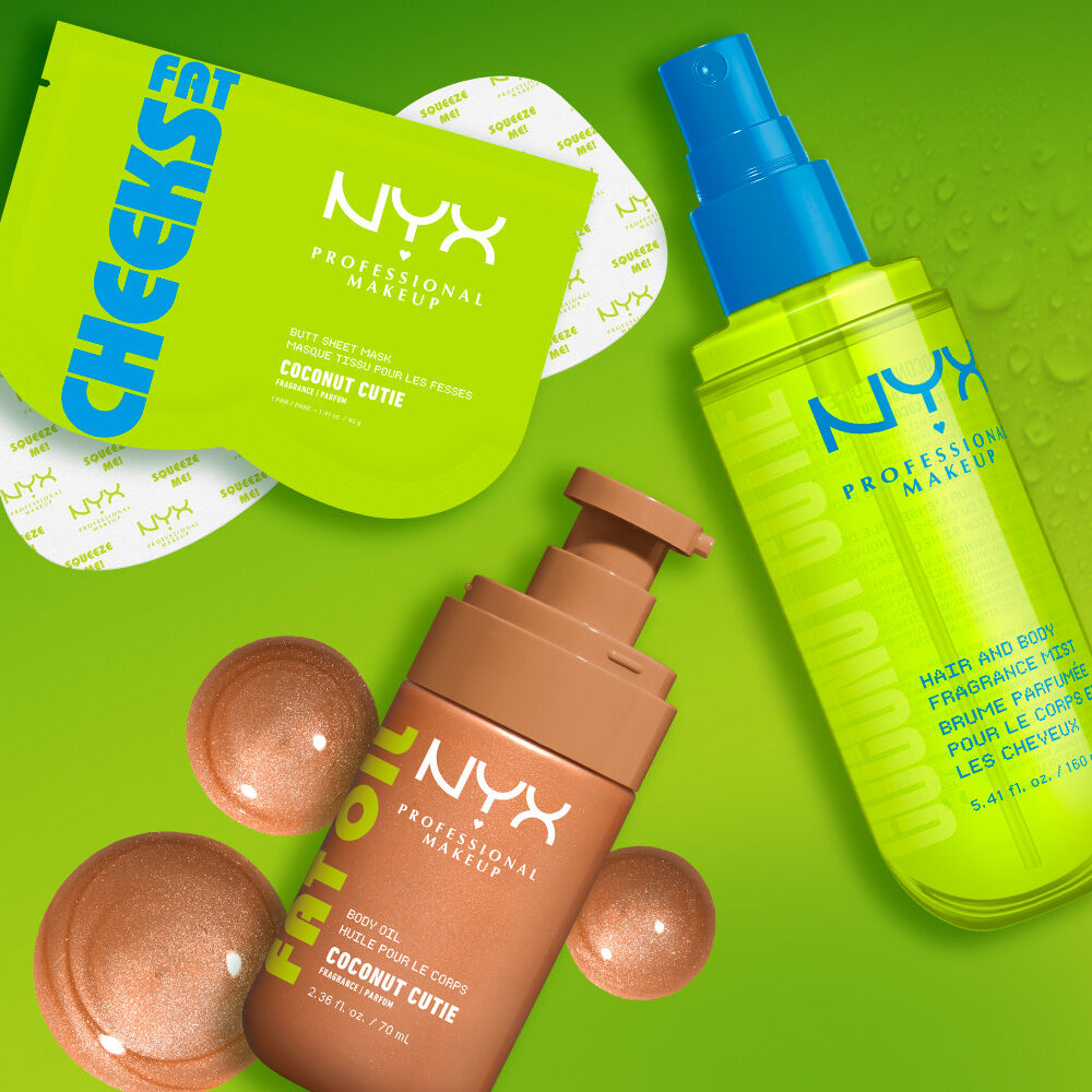 Three NYX Professional Makeup Coconut Cutie products on a lime green background with bronze and clear liquid droplets: Fat Cheeks butt mask, Fat Oil body oil, and hair & body fragrance mist.