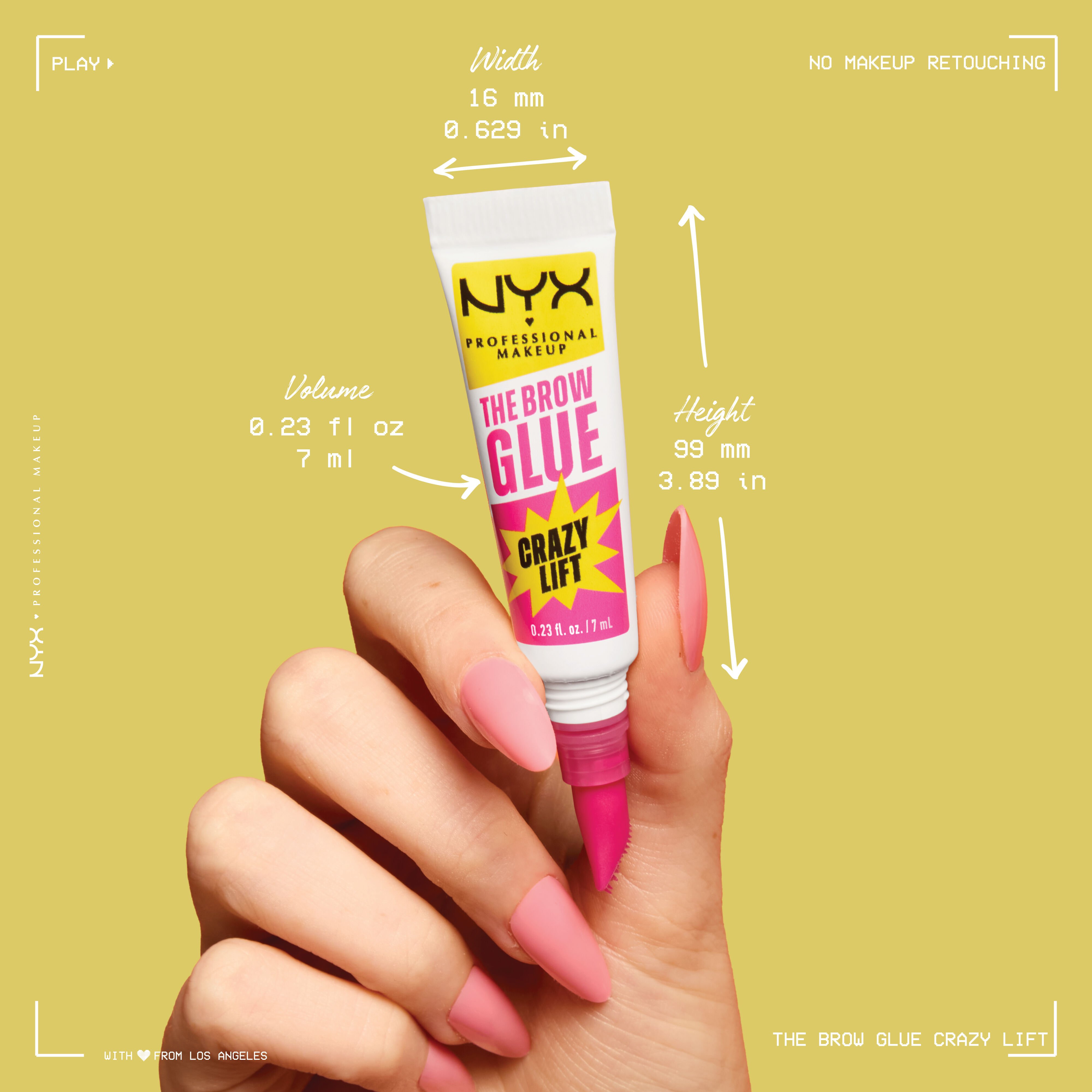 Closeup of The Brow Glue Crazy Lift held by hand with pink nails with product dimensions