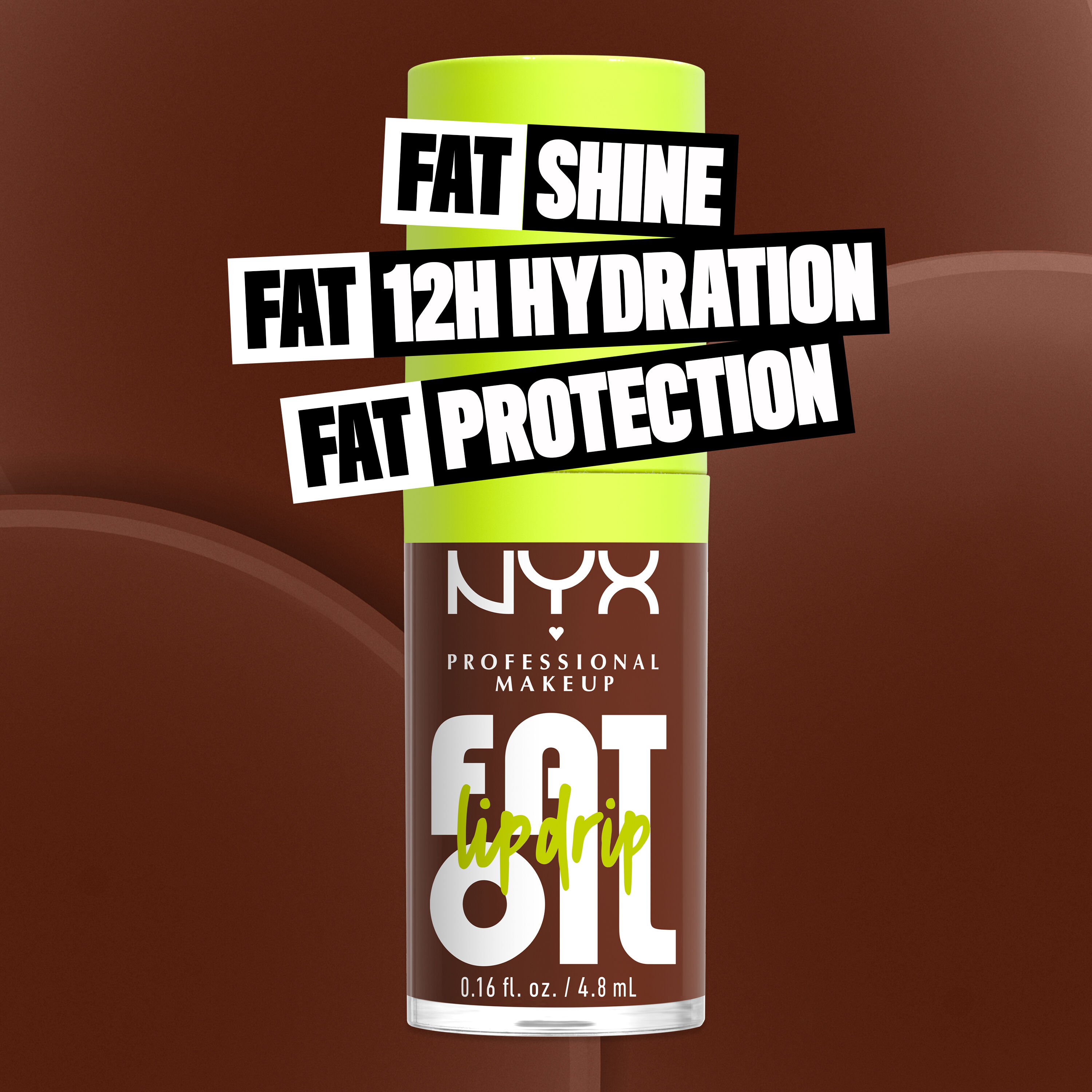 Fat Oil Lip Drip Lip Oil in shade Livin' the Cream bottle. Fat Shine. Fat 12H Hydration. Fat Protection.