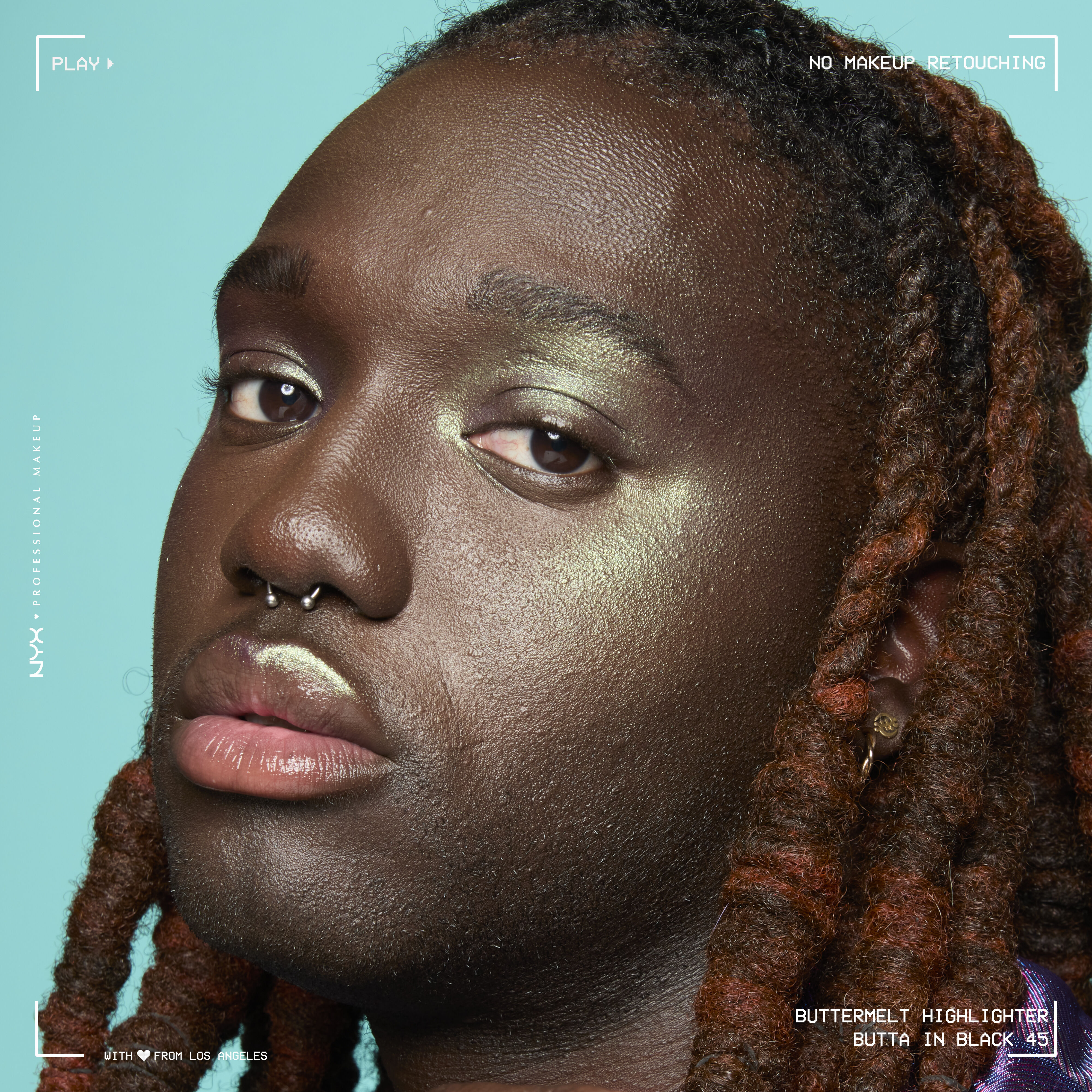 Model wearing Buttermelt Highlighter in shade Butta In Black on cheekbones and browbone