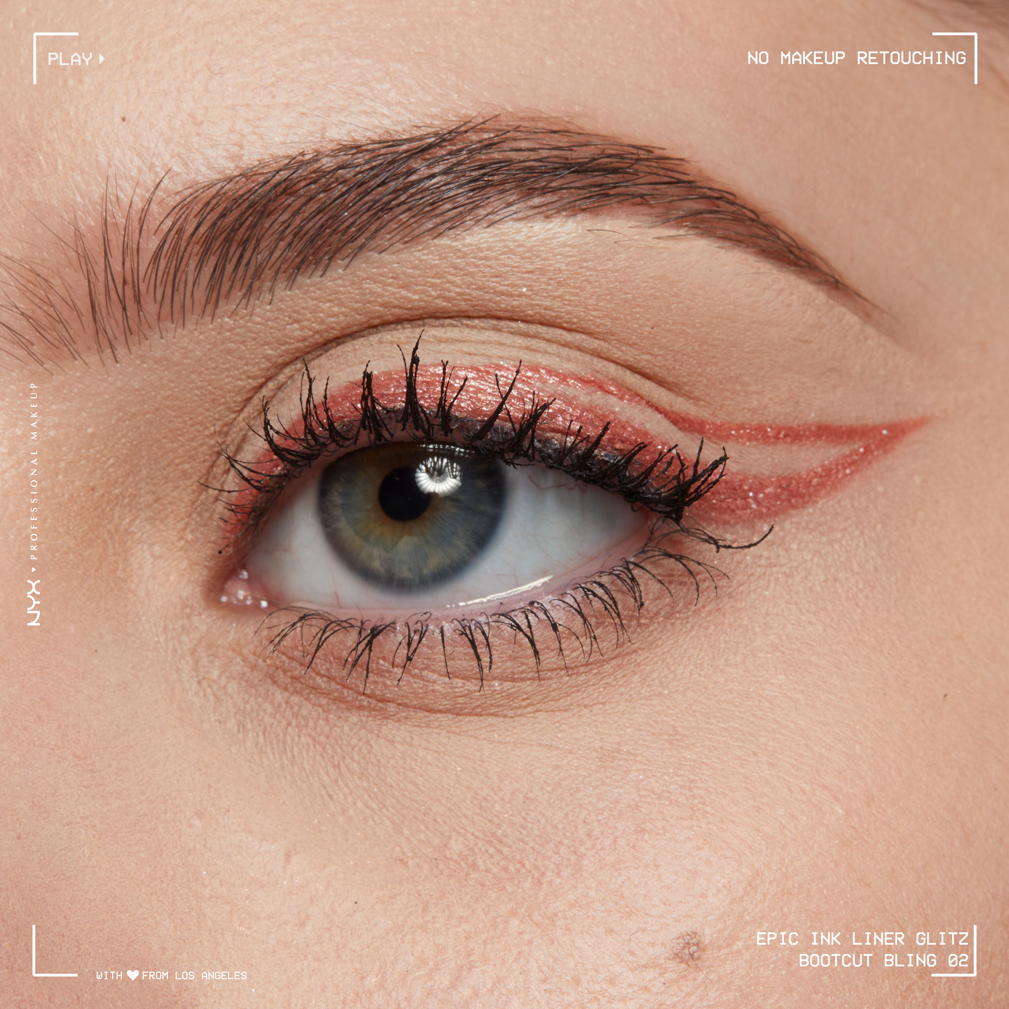 Close-up of an eye wearing Epic Ink Liquid Liner in Bootcut Bling in a negative space winged liner look