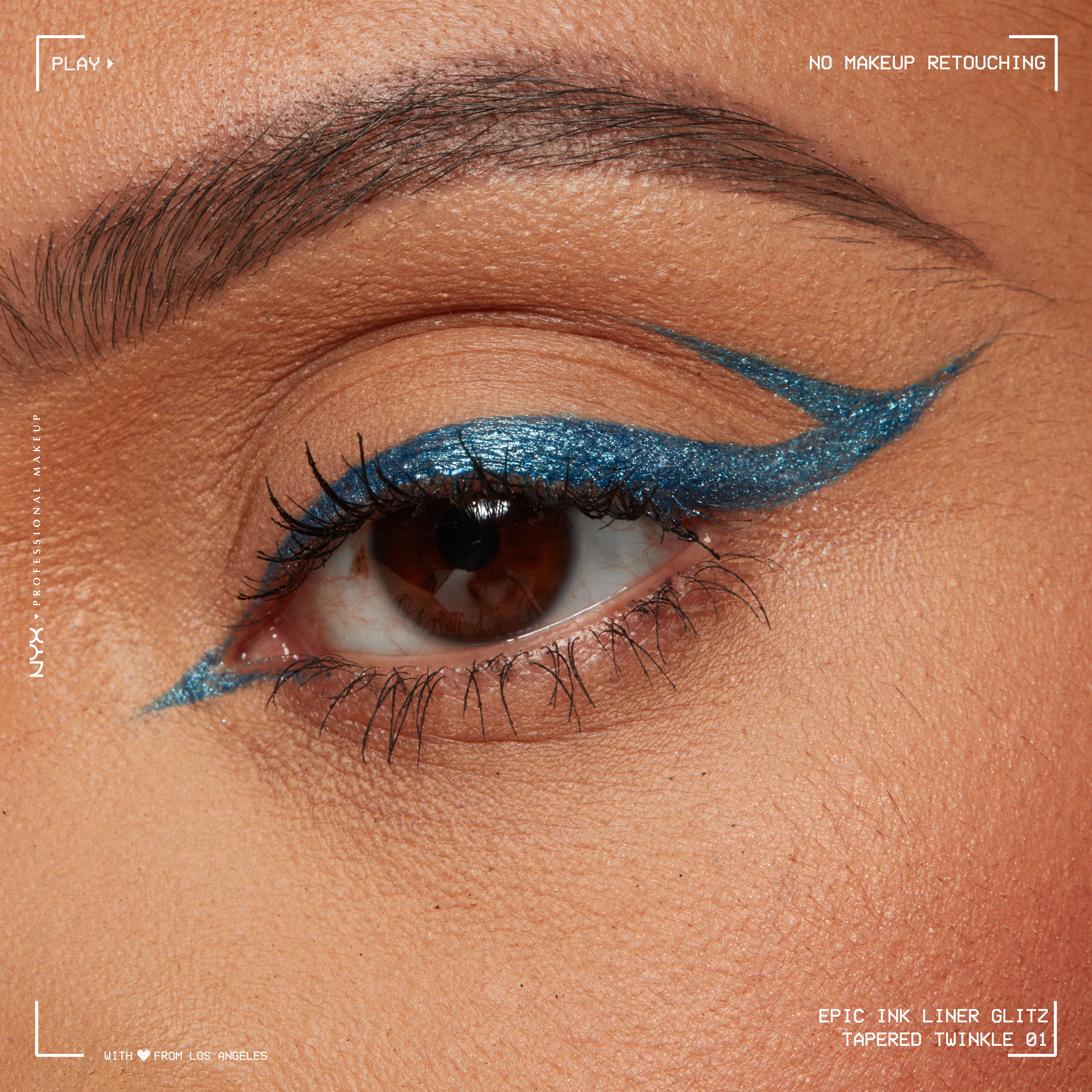 Close-up of an eye wearing Epic Ink Liquid Liner in Tapered Twinkle, in a winged liner look with inner eye eyeliner