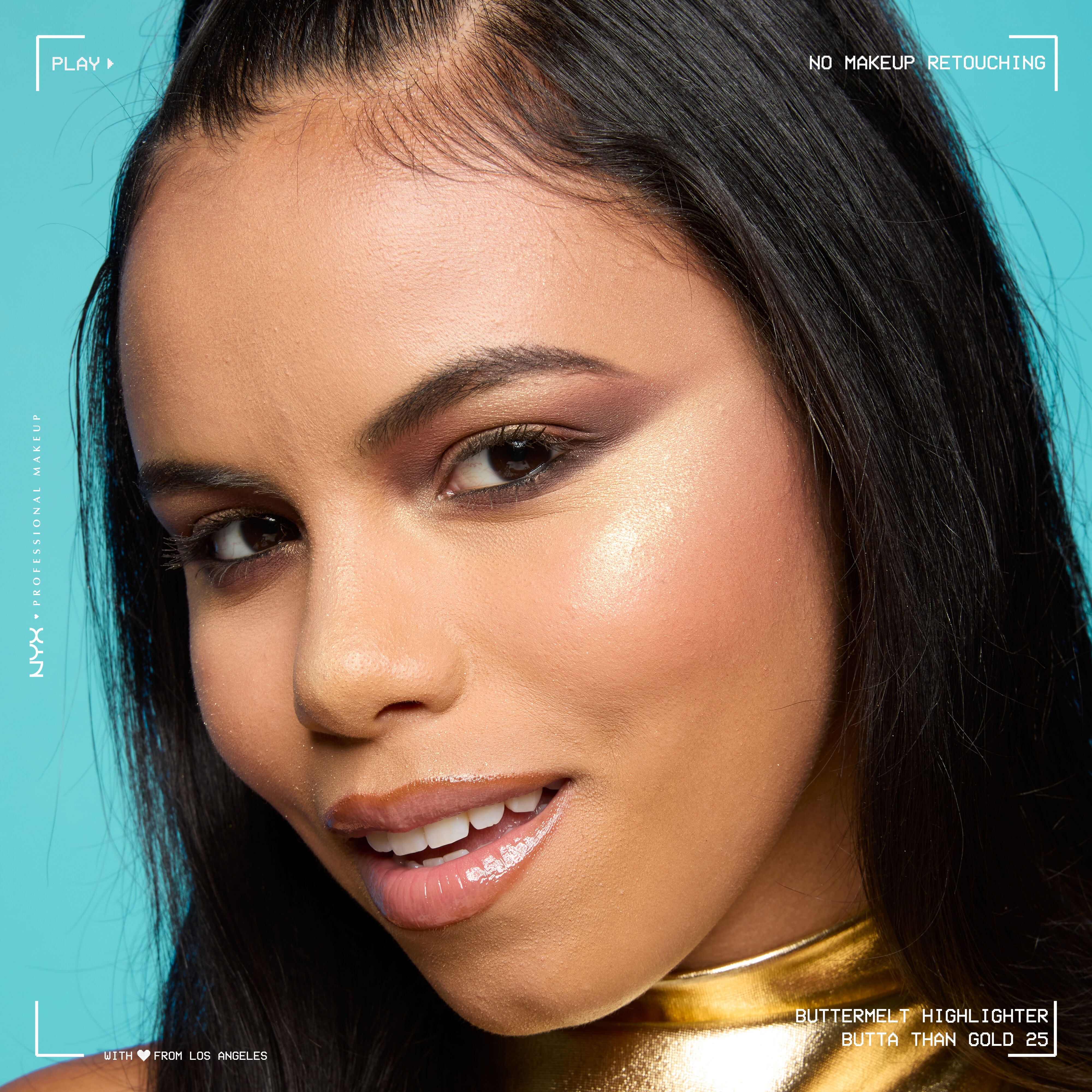 Model looking at the camera and smiling, wearing Buttermelt Highlighter in shade Butta Than Gold, a light gold shade