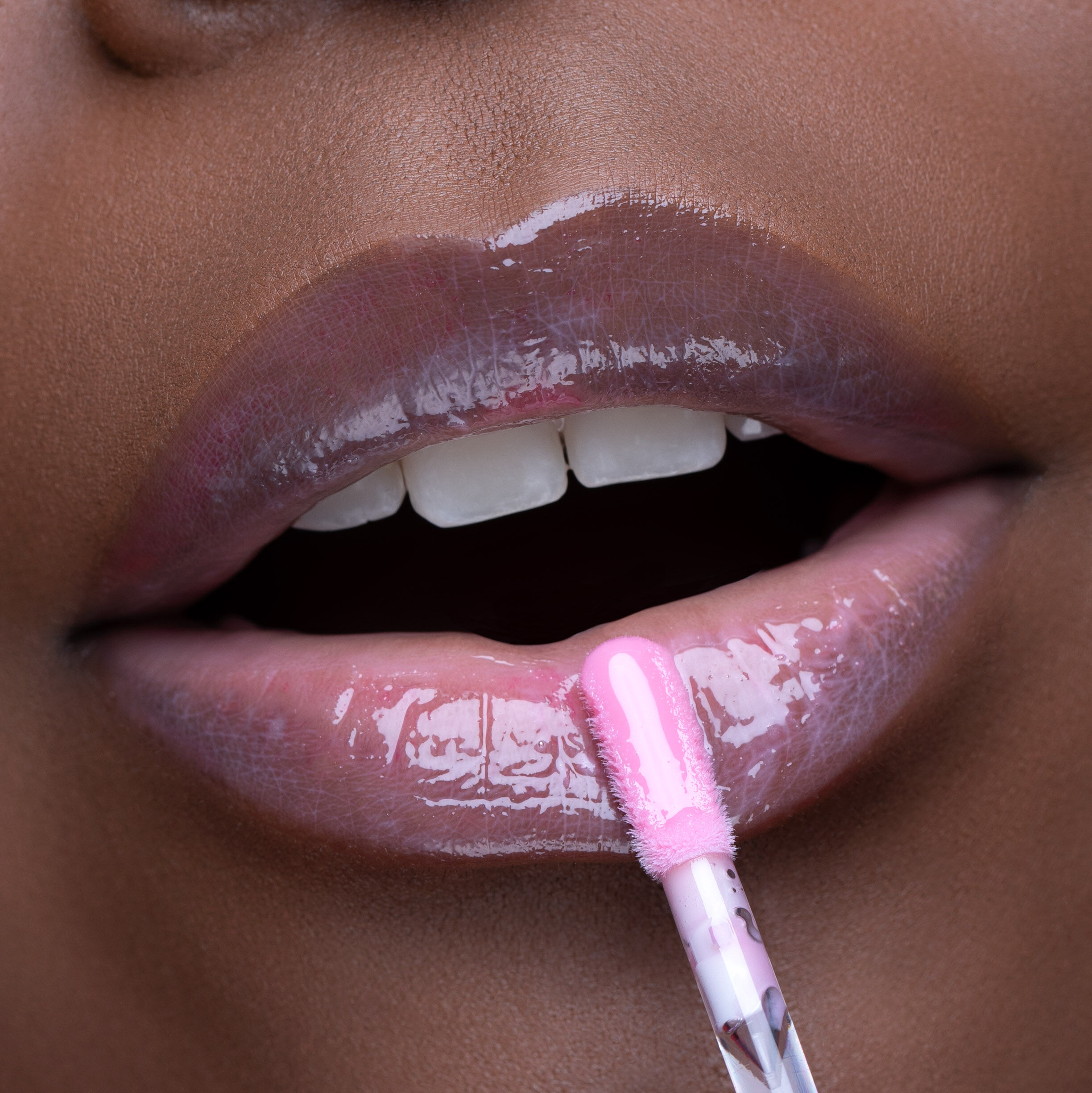 This is Milky Gloss on dark skin