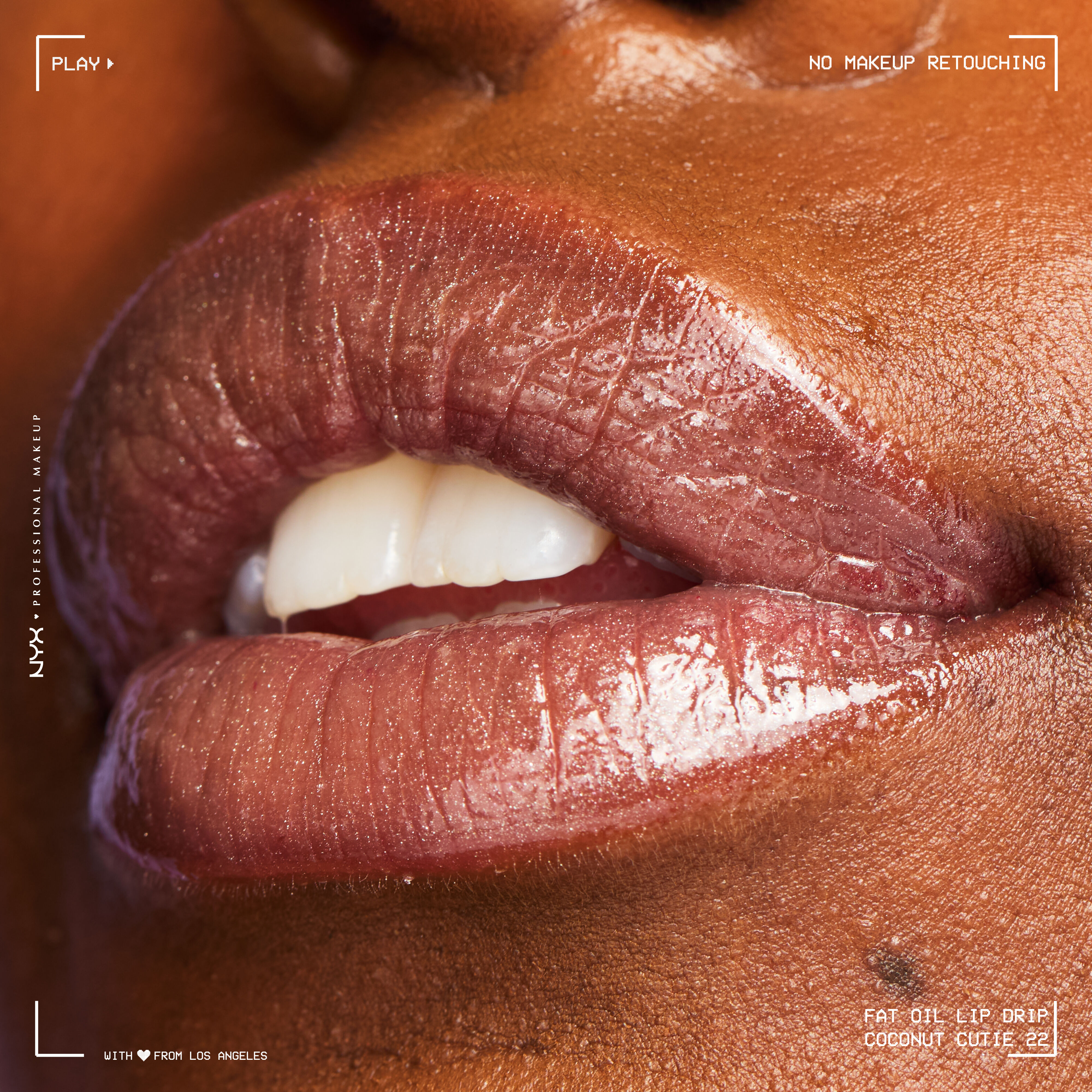 Close-up of model with deep skin tone wearing Fat Oil Lip Drip in Coconut Cutie, showing hydrated shine and natural texture.