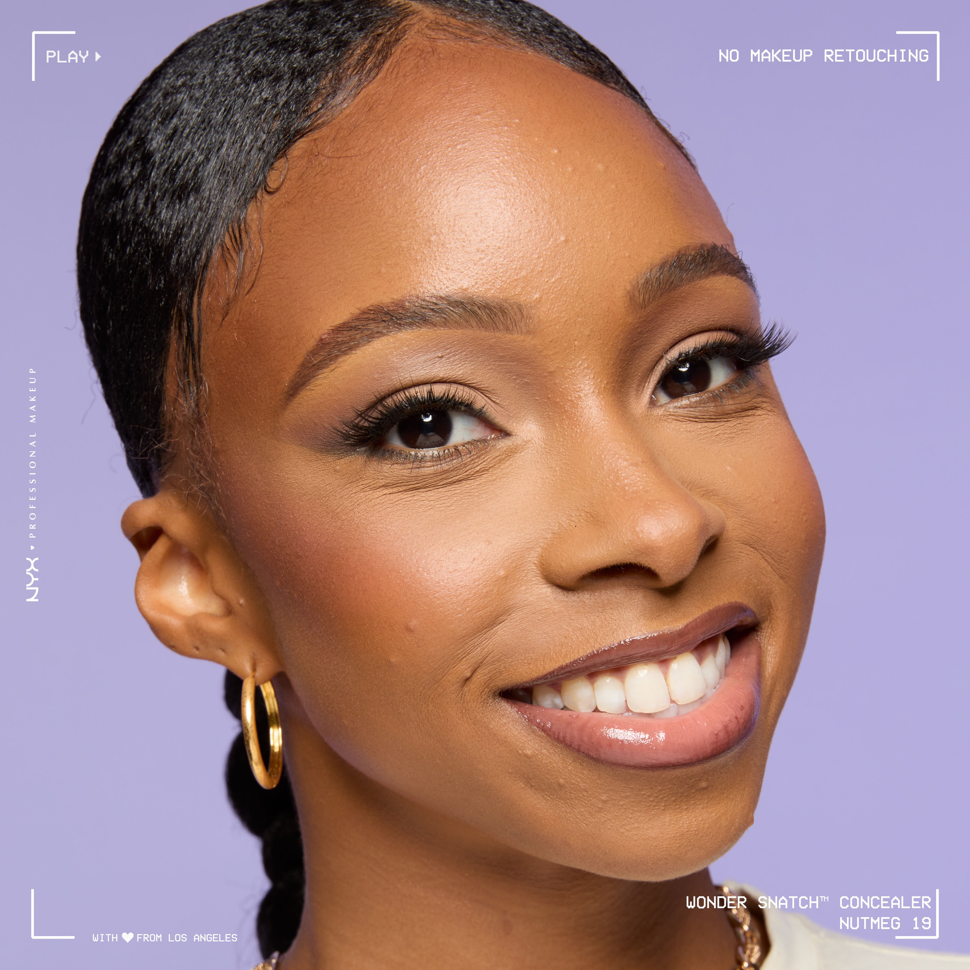 Close-up of model wearing Wonder Snatch(TM) Concealer, with brightened under-eyes, smooth-looking skin, and a natural finish.