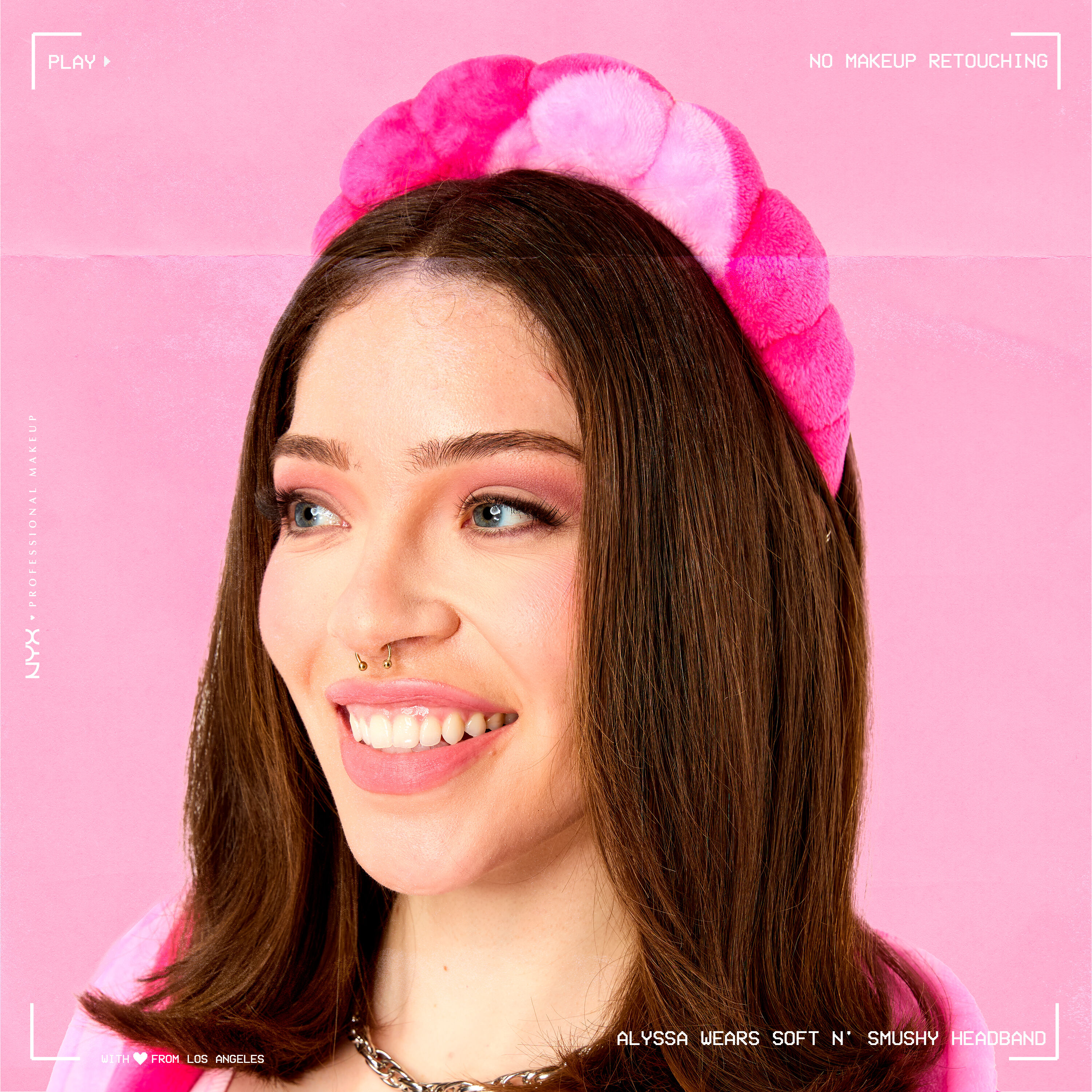 Model wearing Soft n' Smushy Pink Checker Print Bubble Hairband standing slightly diagonally