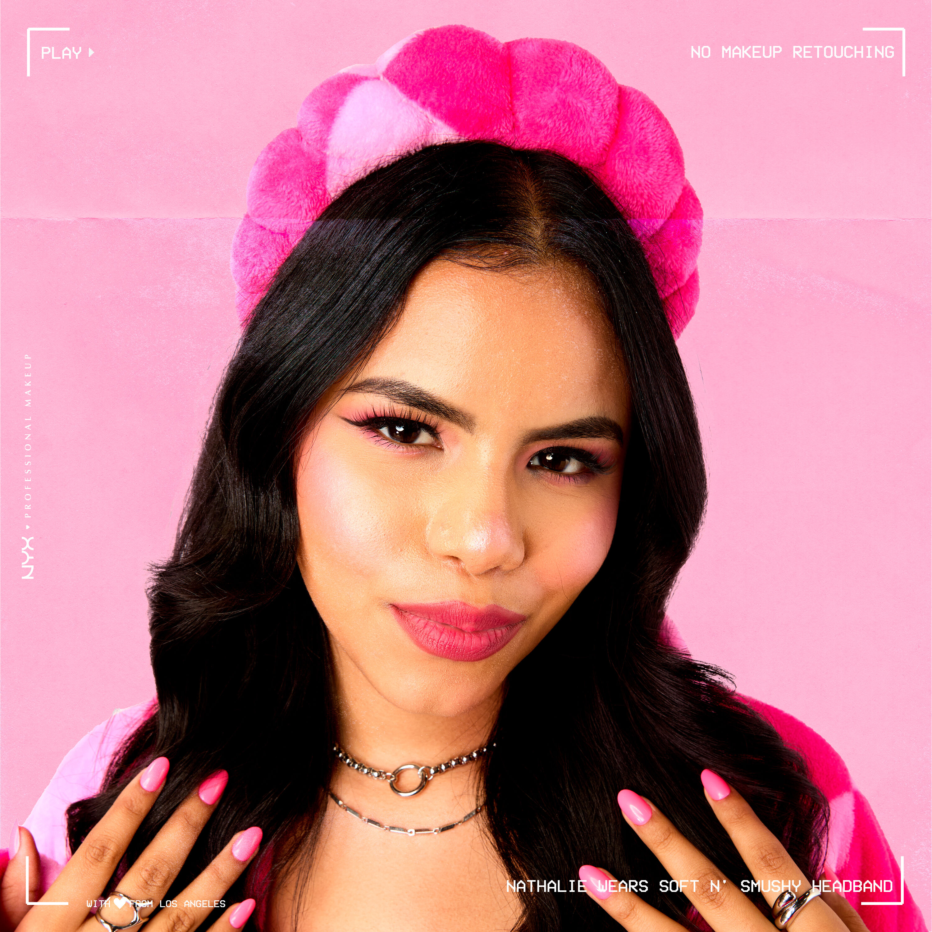 Model wearing Soft n' Smushy Pink Checker Print Bubble Hairband looking at the camera