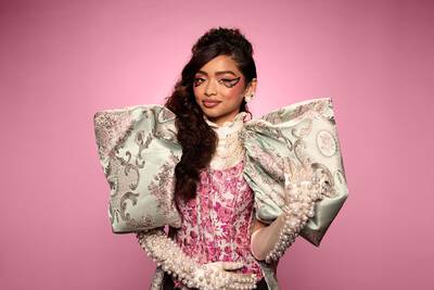 Frankenstein’s bride Halloween makeup look, with fake stitches & blue green and silver eye look