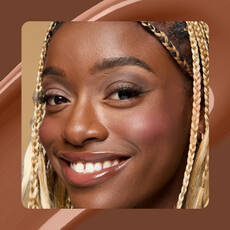 Close-up of model wearing Wonder Snatch(TM) Concealer in Shade27 Walnut.