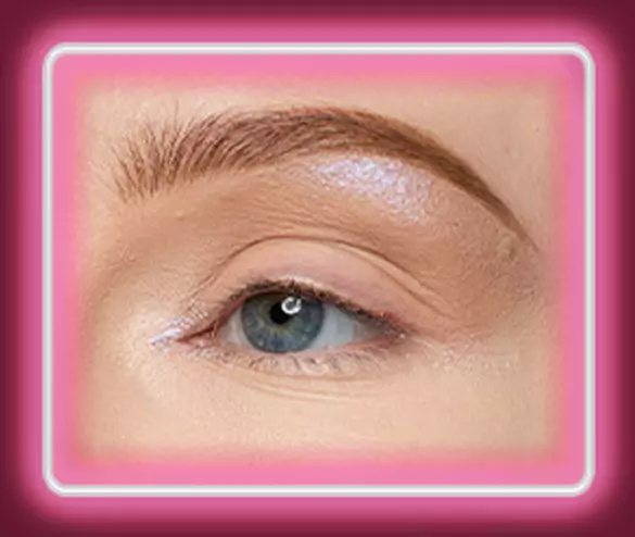 Step 2 of the Lid Lingerie eye look: 10 Lacy Lilac shimmer cream eyeshadow brightening the brow bone and inner corner of a fair-skinned eye for a soft highlight.