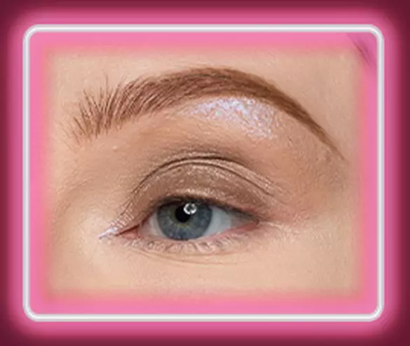 Step 3 of the Lid Lingerie eye look: 07 Granite Grind metallic taupe cream eyeshadow swept all over the lid of a fair-skinned eye for a sultry, long-wearing shimmer wash.