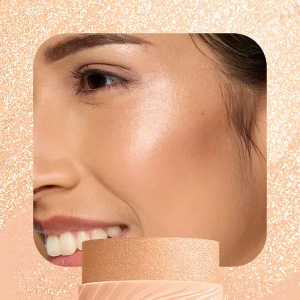 Model with champagne highlight wearing NYX Buttermelt Stix in A Whole Melt 06 showing radiant golden shimmer