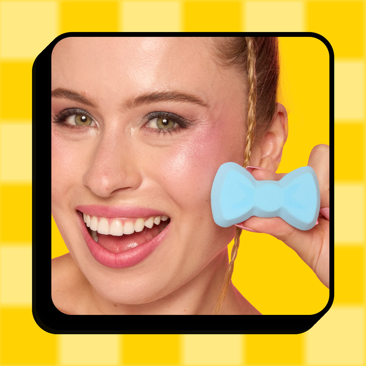 A model holding NYX Maggie Simpson Bow Makeup Sponge shown in handon yellow pink background.