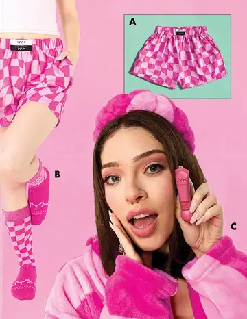 A collage featuring pink checkered shorts, matching socks, and a person holding a NYX Soft Matte Lip Cream in pink packaging, all set against a pink background.