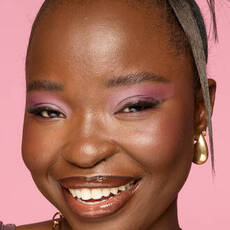 Model wearing NYX Make’em Wonder™ Foundation in shade 42 Deep Walnut with radiant finish and warm undertone.