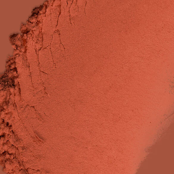 Texture swatch of Wonder Snatch™ Setting Powder in shade Cacao Craze, a translucent deep shade