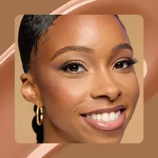 Close-up of model wearing Wonder Snatch(TM) Concealer in Shade 19 Nutmeg.