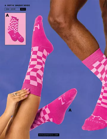 Pink and white checkered socks labeled "Soft N' Smushy Socks" displayed on a blue background, worn by two individuals. Price listed as $12.