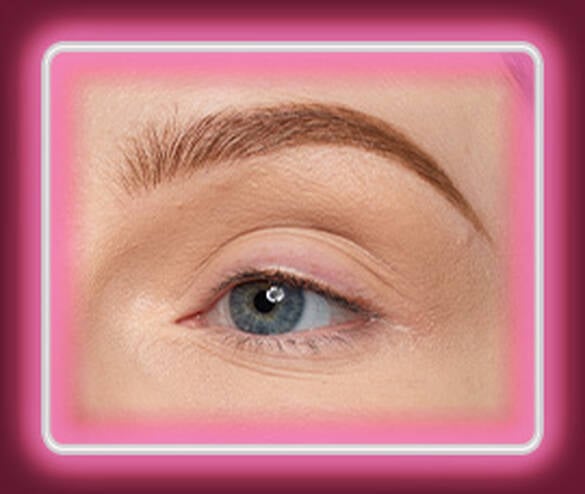 Step 1 of the Lid Lingerie eye look: 03 Beige Appeal matte cream eyeshadow softly contoured into the crease of a fair-skinned eye, framed in a pink neon border.