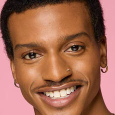 Model wearing NYX Make ’Em Wonder™ Foundation in shade 34 Mahogany with soft matte finish and warm undertone.