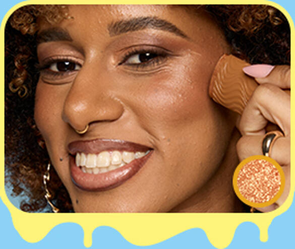 Model applying NYX Buttermelt Stix in Melt You Later 11 to cheekbone for warm bronzed glow