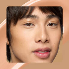 Close-up of model wearing Wonder Snatch(TM) Concealer in Shade 12 Natural.