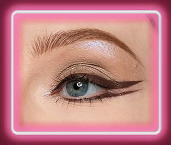 Step 4 of the Lid Lingerie eye look: 06 Mocha Mesh matte espresso cream eyeshadow drawn into a graphic winged liner along the lash line of a fair-skinned eye.
