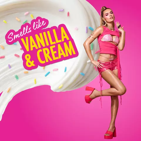 Creamy vanilla splash with colorful sprinkles on a bright pink background, with text reading Smells like Vanilla & Cream for the Suga Baddie scent by NYX Professional Makeup Body Collection.