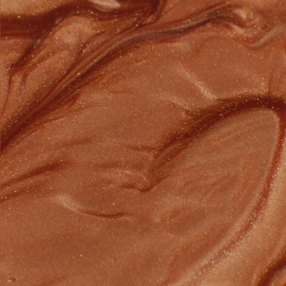 A bronzed shimmer finish swatch with a golden, glowy finish from NYX Professional Makeup Fat Oil Body Oil.