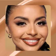 Close-up of model wearing Wonder Snatch(TM) Concealer in Shade 16 Golden.